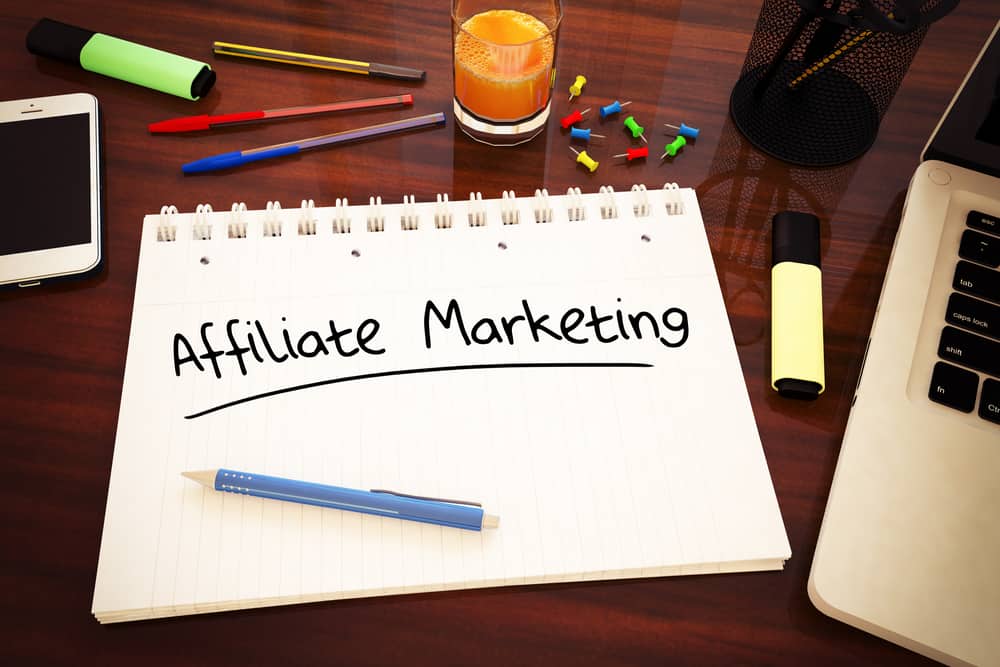 A notebook promoting lead generation through affiliate marketing.