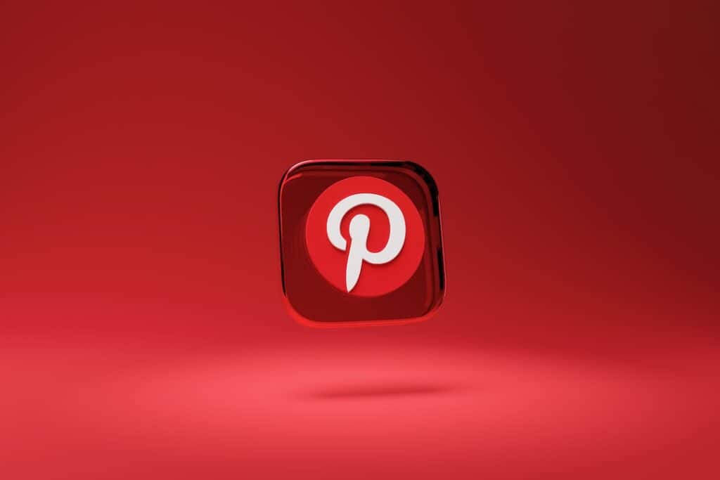 An image of a pintrest logo on a red background.